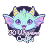 A cartoon-style logo featuring a cute light blue and mint green wyvern with pink fins, purple eyes, and yellow horns, above the text 'Ki Wyvern Crafts'